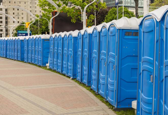 a row of portable restrooms at a trade show, catering to visitors with a professional and comfortable experience in Benton LA